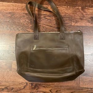 Large, dark brown zip top Parker clay bag